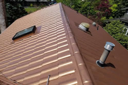 Photo of a house with a new roof.